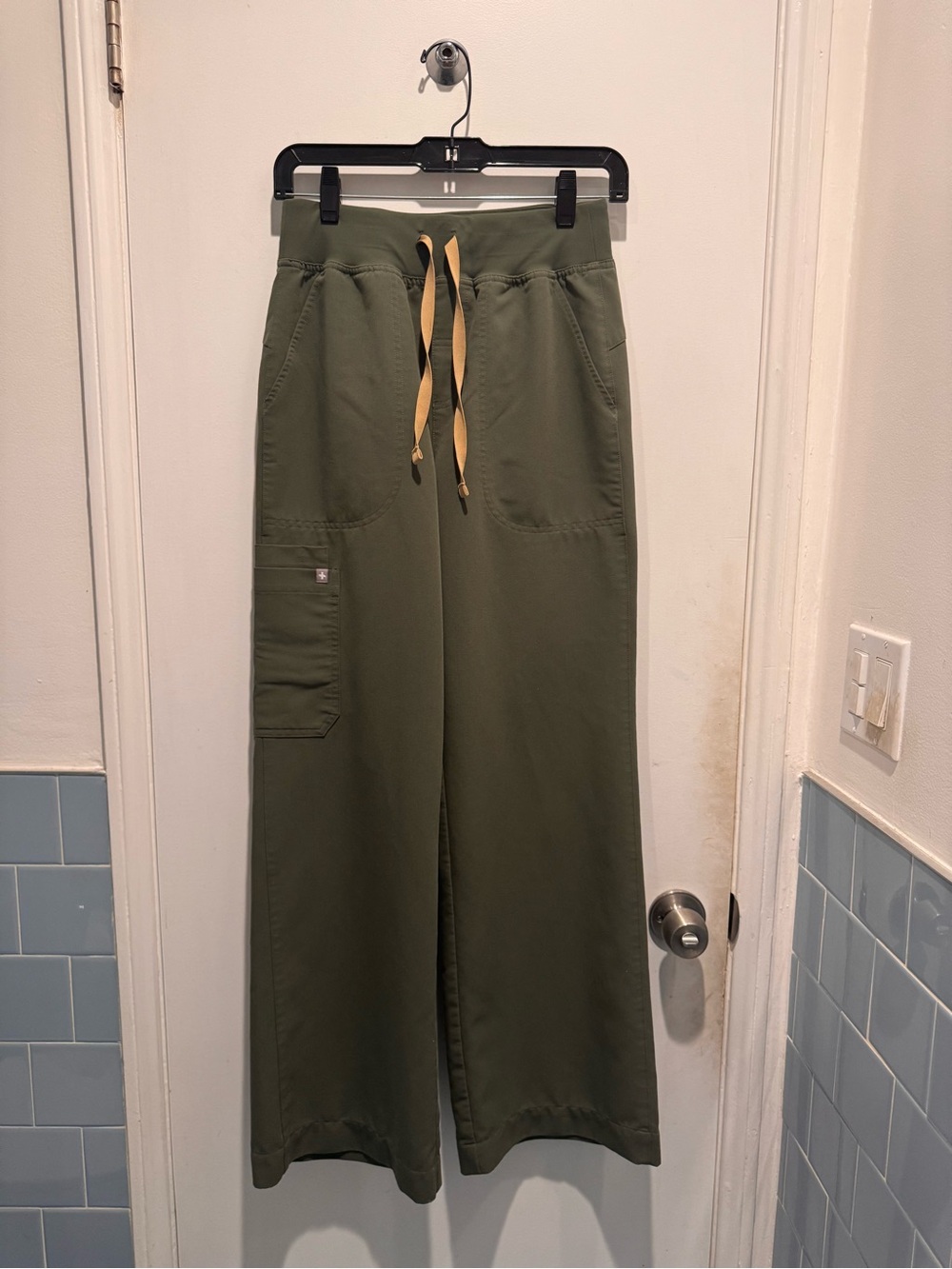 2 sets of Figs tops size xsm and bottoms size sm